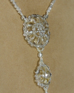 collier cerchi preziosi  - beije-cenere - particolare