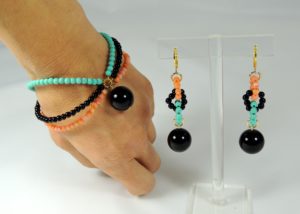 Parure corallo-turchese-nero